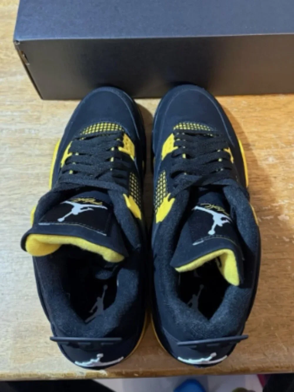 Men’s Nike Air Jordan 4 Retro Thunder Black Yellow Sneakers